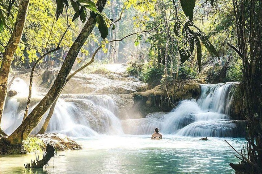 1 DAY Mekong Cruise to Pak Ou Caves. Kuang Si Waterfalls . Local Villages