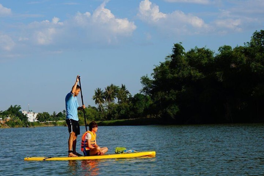 Stand Up Paddle Boarding and Sunset Watching on Cai River