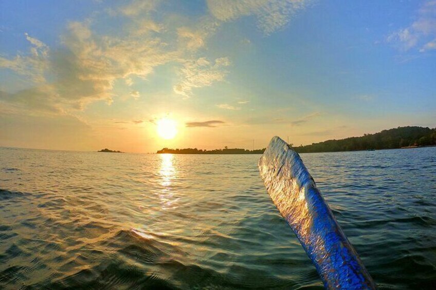 View Sunset on the sea from kayak