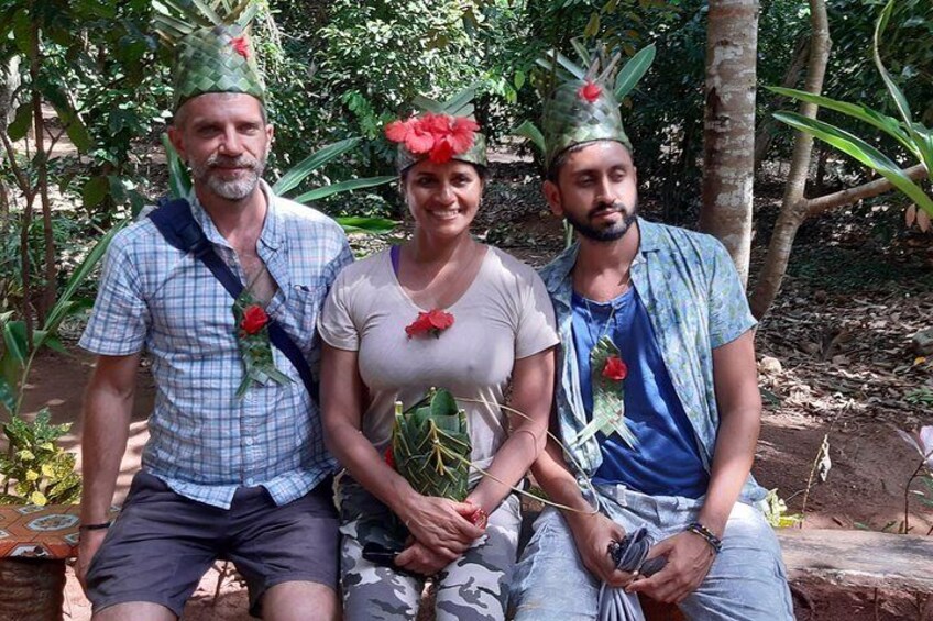 tourists wearing local made hat at jambo spice farm