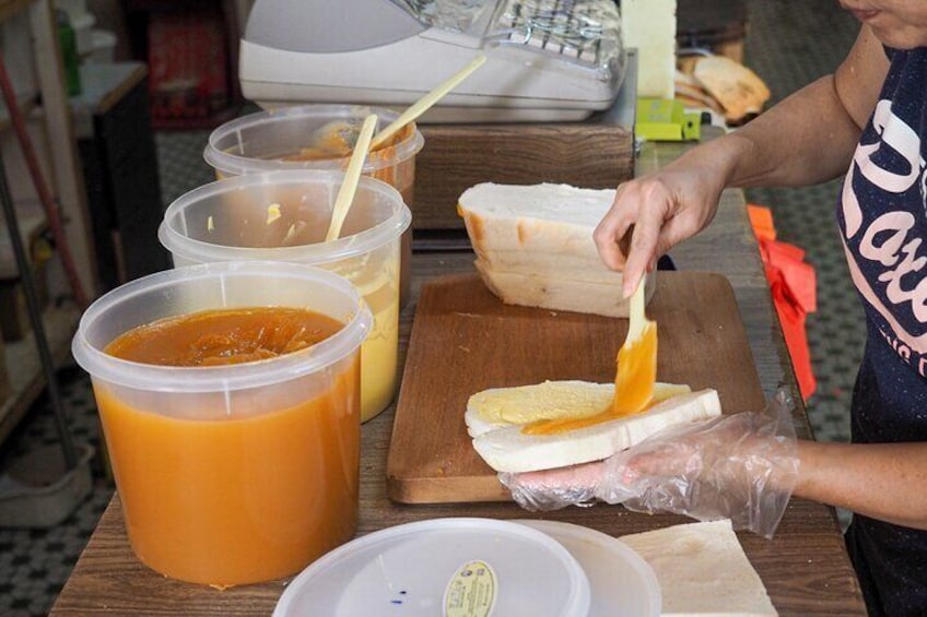 Freshly baked bread slate with kaya and margarine