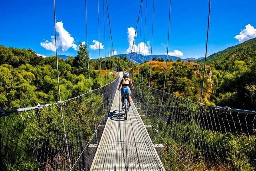 bike ride the Twin River trail into the famous Gibbston Valley wine region.