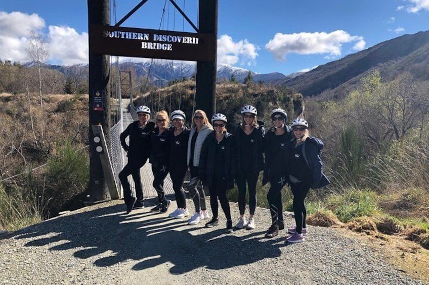 Girls group riding the Southern Discoveries bridge into the Gibbston Valley Wine region.