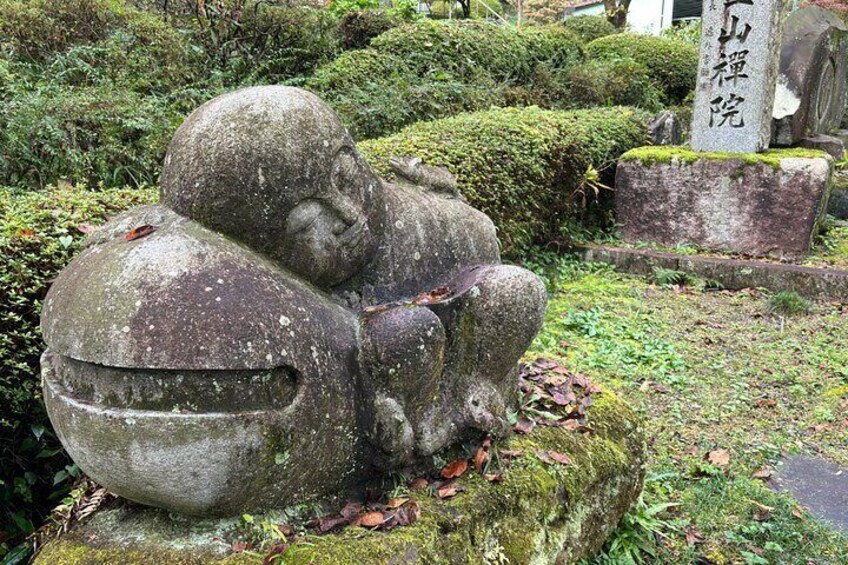 A Jizo in the forest.