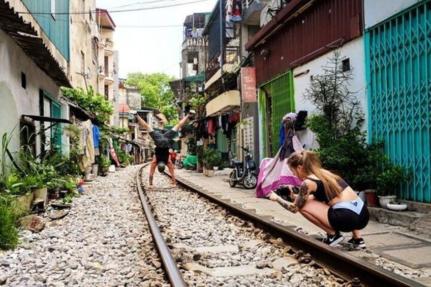 Excited to take photo on train street