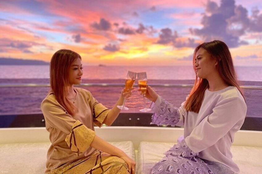 The Sunset Dinner Cruise session grants you a view of sunset over the sea