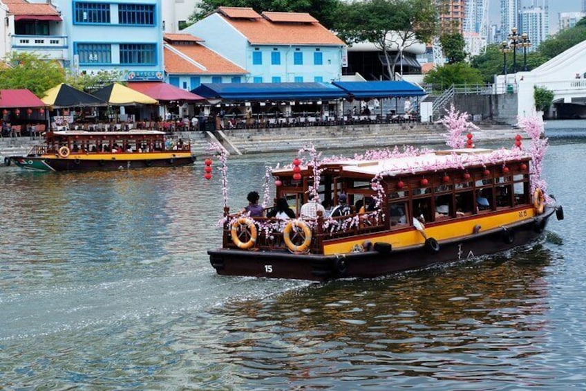 Enjoy a relaxing ride on a bumboat along the Singapore River