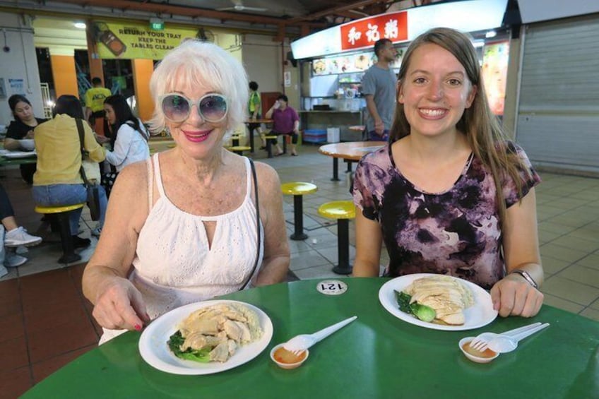 Enjoying the chicken rice at Maxwell center