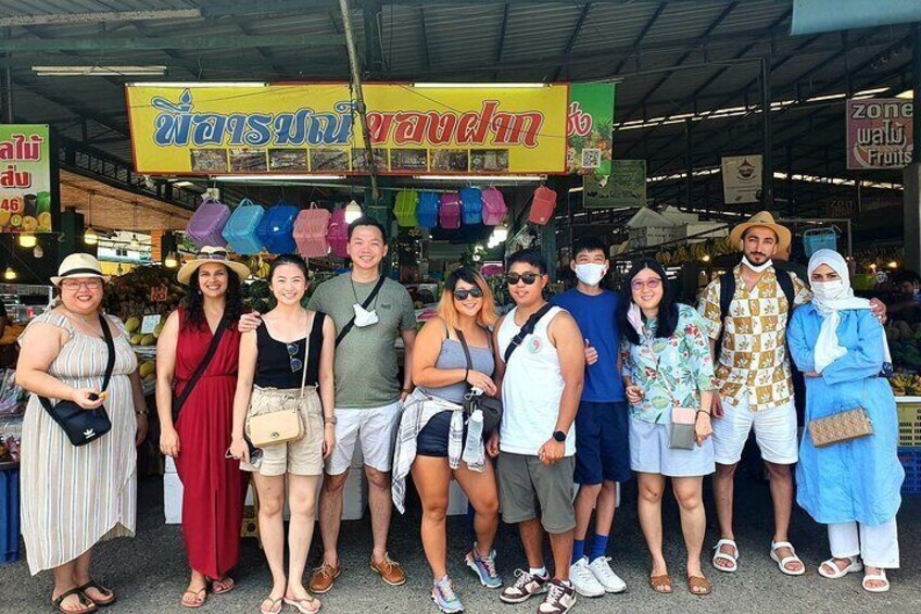 Fruit tasting, selecting and buying ingredients at the market