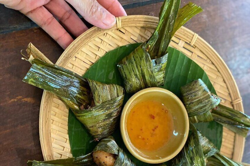 Chicken wrapped with Pandanus leaf.