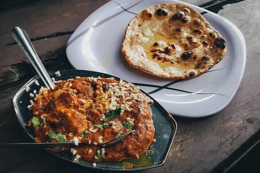 Try a dozen Delhi dishes including butter paneer with crispy naans.