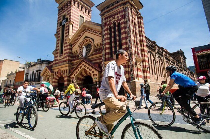 Every Sunday and holiday cyclists take over Bogotá’s busy thoroughfares as half of the roads are closed to traffic during the Ciclovía community program.