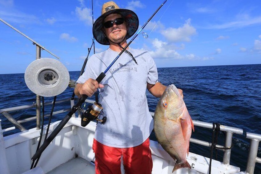 Captain David With A Mutton Snapper