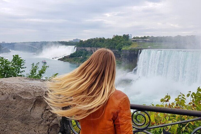 Viewing the Falls during her Niagara Falls tour - Enjoy free time for photos and sightseeing