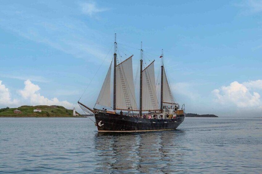 Tall Ship Silva cruises by Georges Island National Historic Site