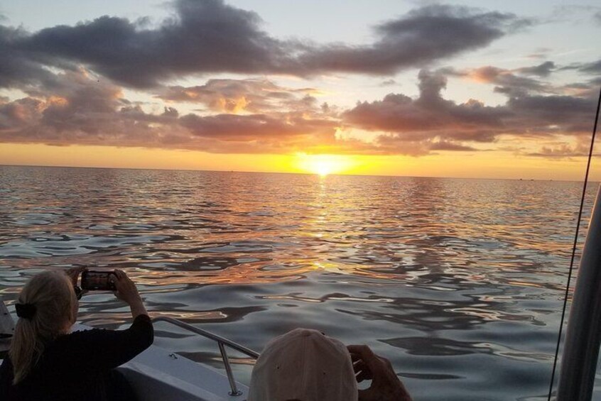 our guests taking photos of the sunset