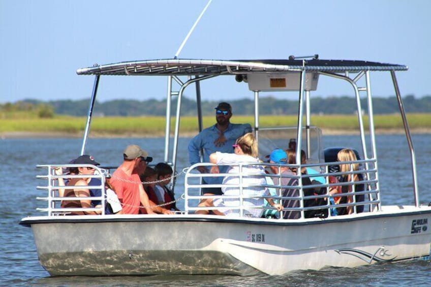 Tour guide interpreting about the salt marsh 