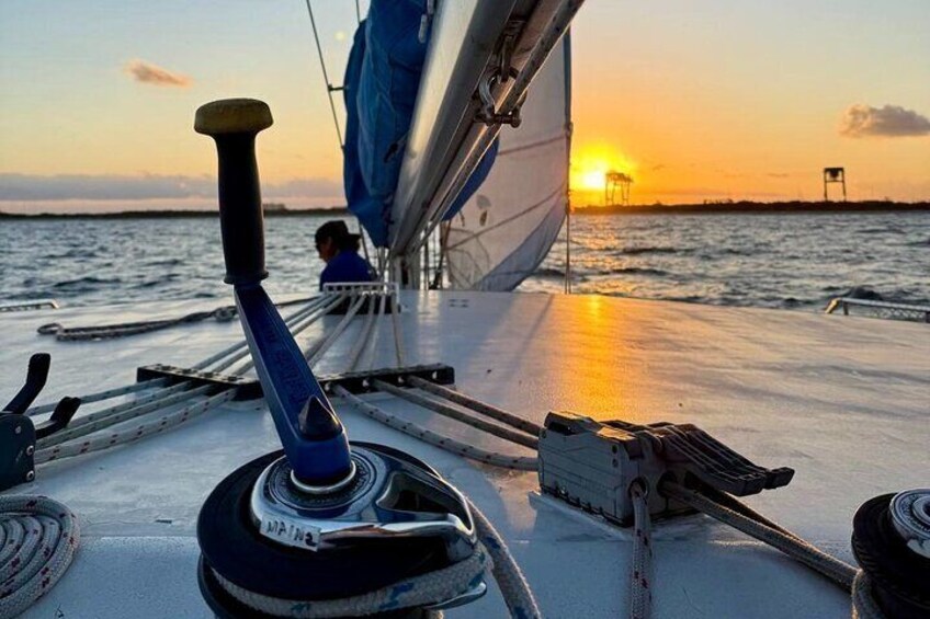 Sunset at the helm of Spirit of Lauderdale Catamaran. Sailing our Sunset Cruise