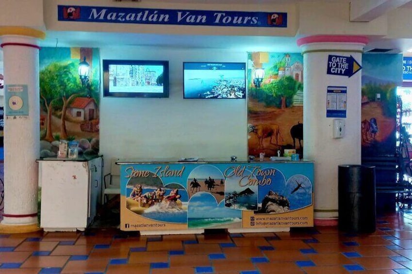 Tour desk inside the cruise ship terminal building