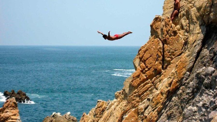 High cliff divers in La Quebrada in our tour