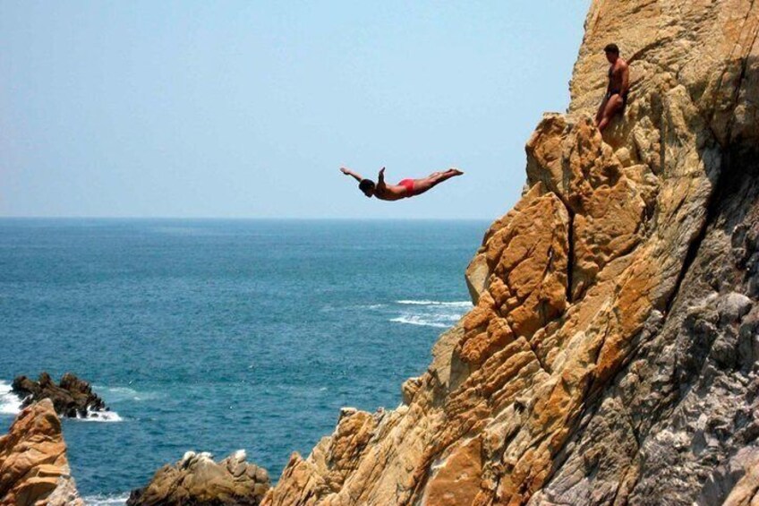 High cliff divers in La Quebrada in our tour