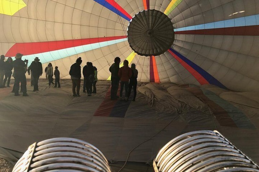 Walk inside the hot air balloon as it inflates.
