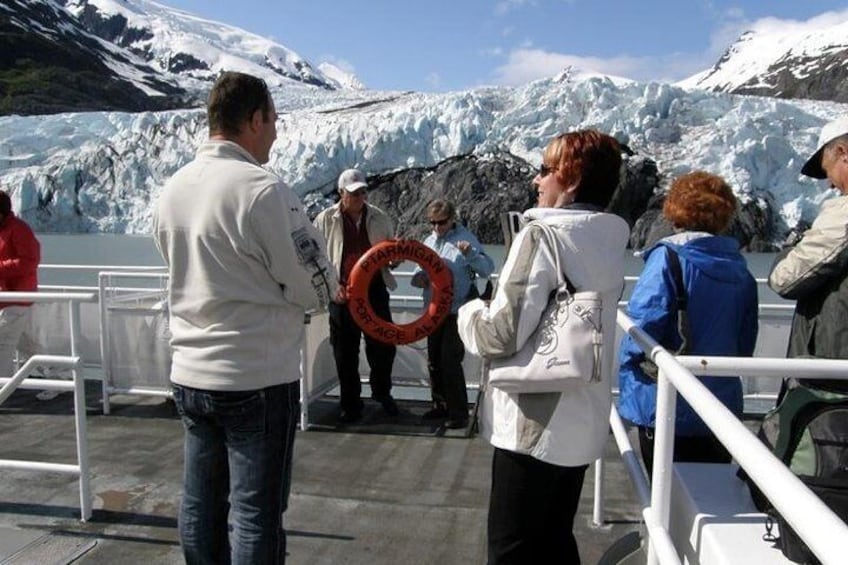 Everyone takes a good picture in front of the Portage Glacier!