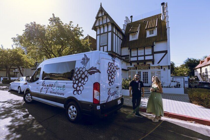 Guests arrive to their next winery in a luxurious and roomy shuttle