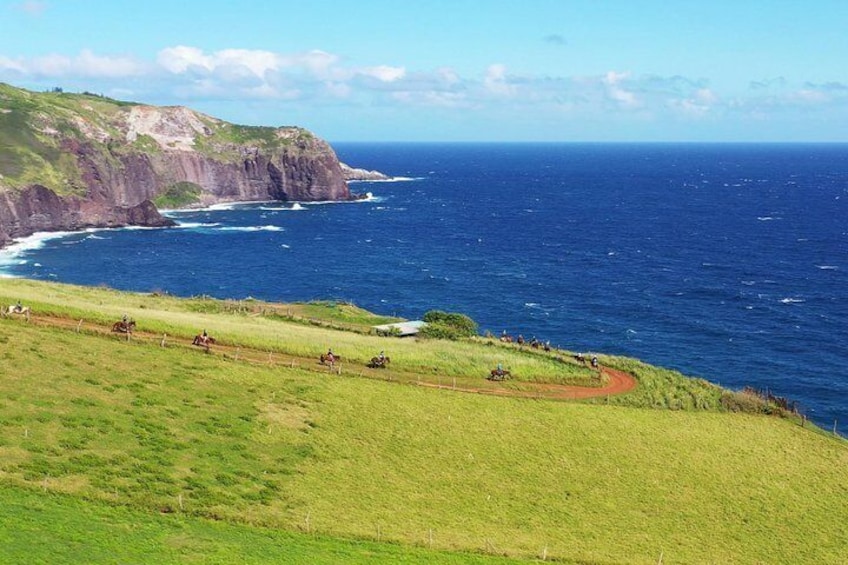 Ride along the mountain side overlooking the Pacific Ocean.