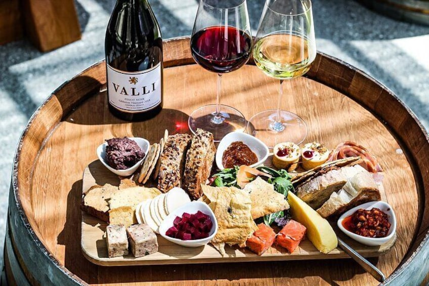 Tour includes a sumptuous platter and matching glass of wine.