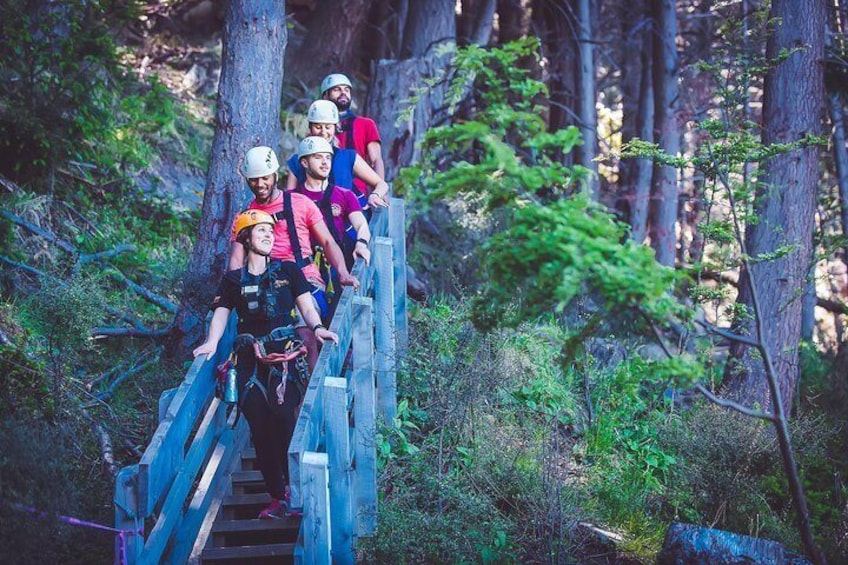 Breathe in mountain air as you trek between ziplines