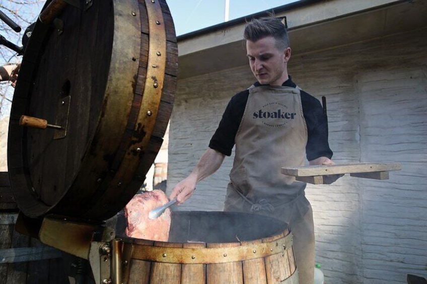 Lunch being cooked in wine barrels