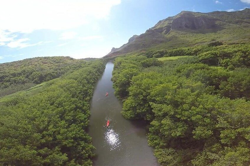 Paddle downwind, hike to waterfalls