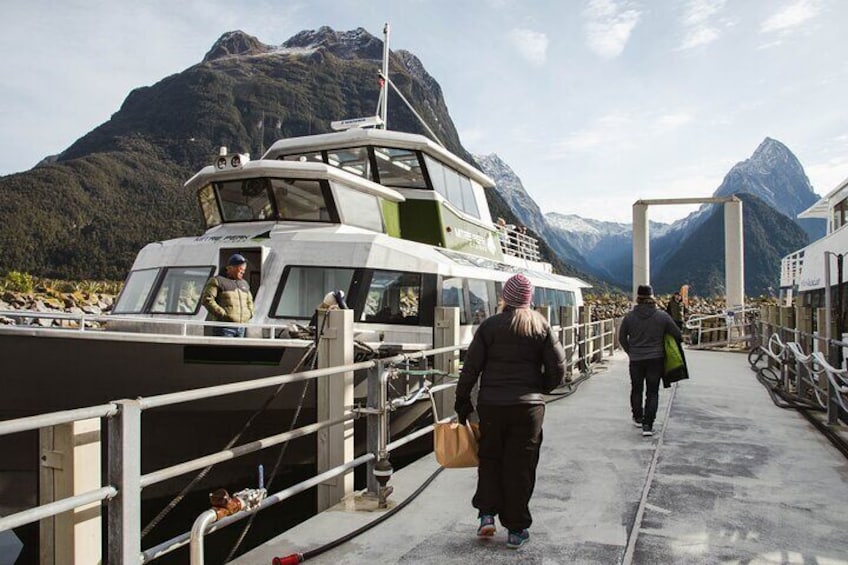 Boarding a small boat nature cruise