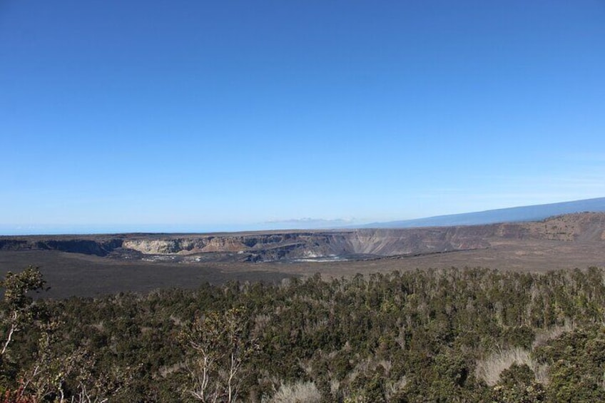 Amazing Halema‘uma‘u Crater 2.5 miles wide 3 miles deep a Rain Forest on the East side a Desert on the West Side.