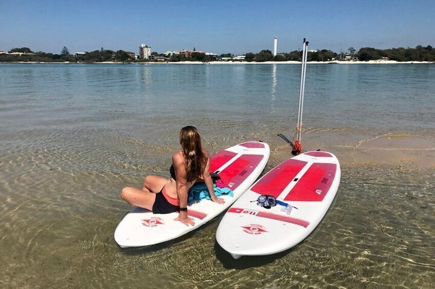 Relaxing on a sand bar at high tide