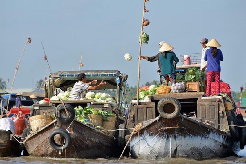Sales on boat in Mekong Delta 
