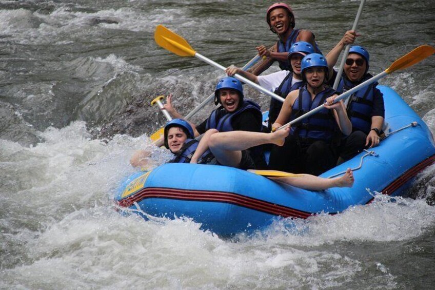 Share laugh together during rafting 