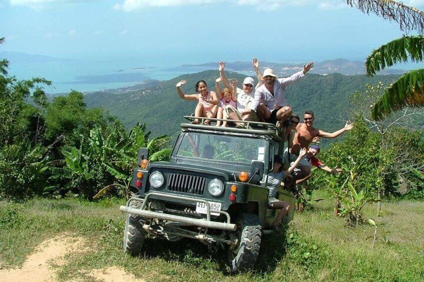 Back of the 4 wheel drive jeep through the mountain, jungle, across rivers and valleys