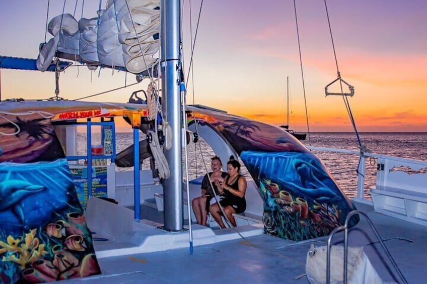 sunset and dolphin catamaran cruise