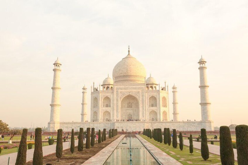 Sunrise at the Taj Mahal palace and surrounding gardens in Agra.