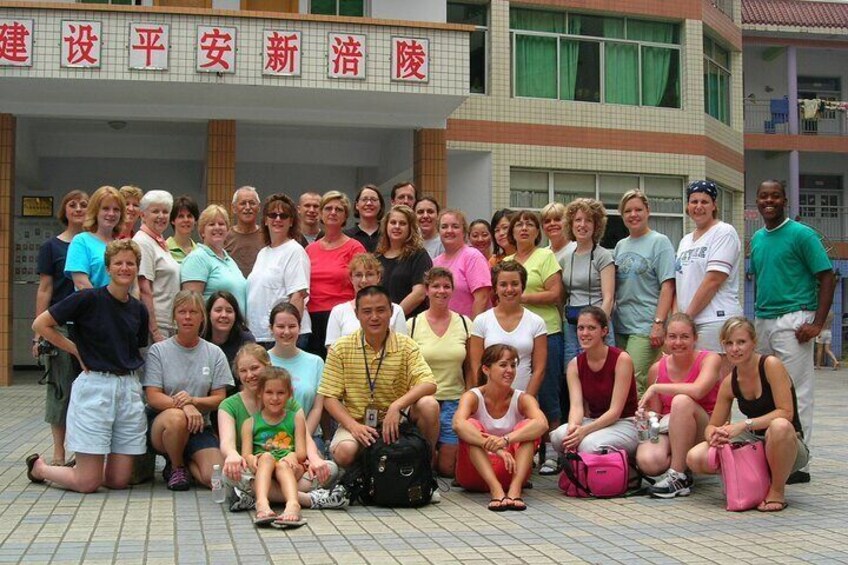 A volunteer+return visit group from AWAA in Fuling Orphanage, Chongqing. I was the big boy in the middle.