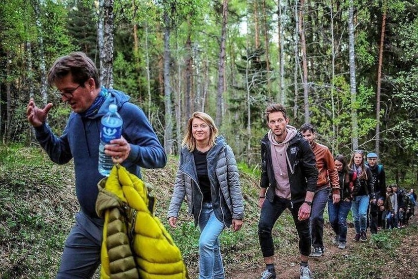 Hiking through the dense pine woods of Aukstaitija National park Park