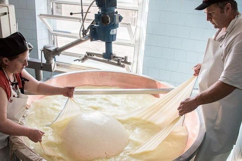 Show item 3 of 7. Parmigiano cheese extraction