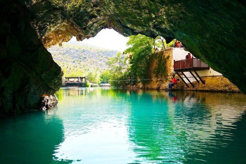 Spring of River Buna inside of cave near Tekki house 