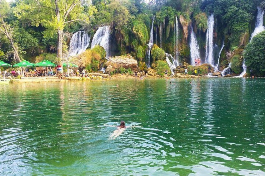 Kravice waterfalls - Hot Summer days are ideal for break and swim in the lake