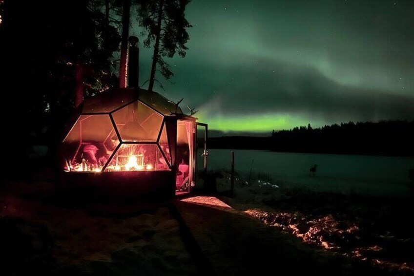 Northern Lights dinner in a Glass Igloo