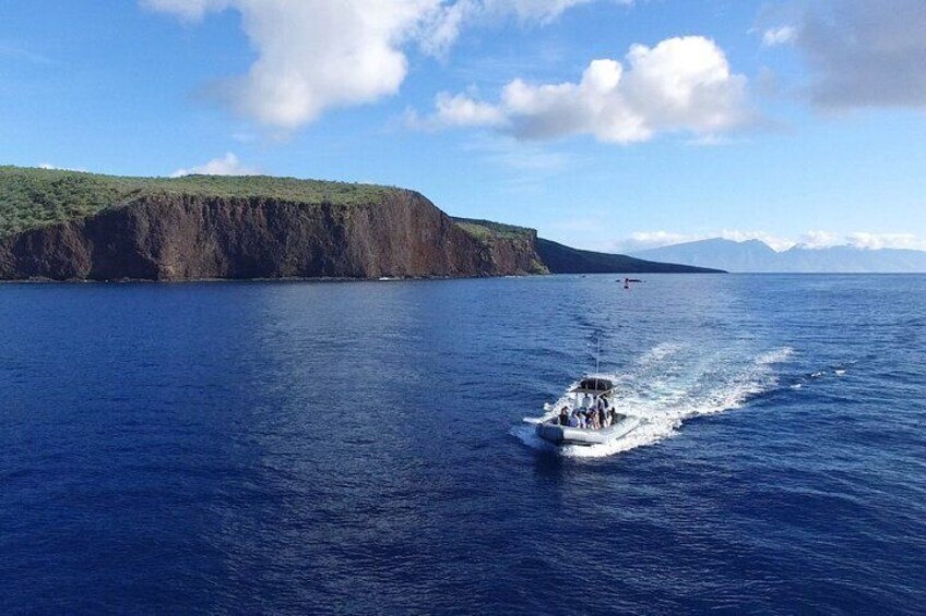 Cruising along Lanai's coast in our adventure rafts!