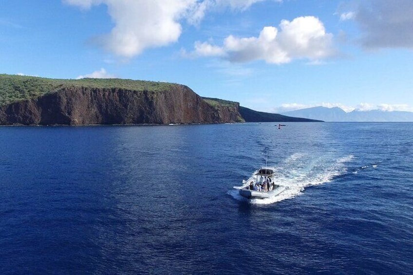 Cruising along Lanai's coast in our adventure rafts!