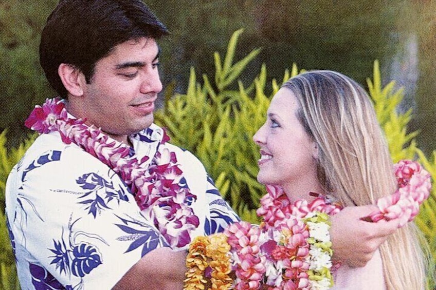 Greeter giving leis